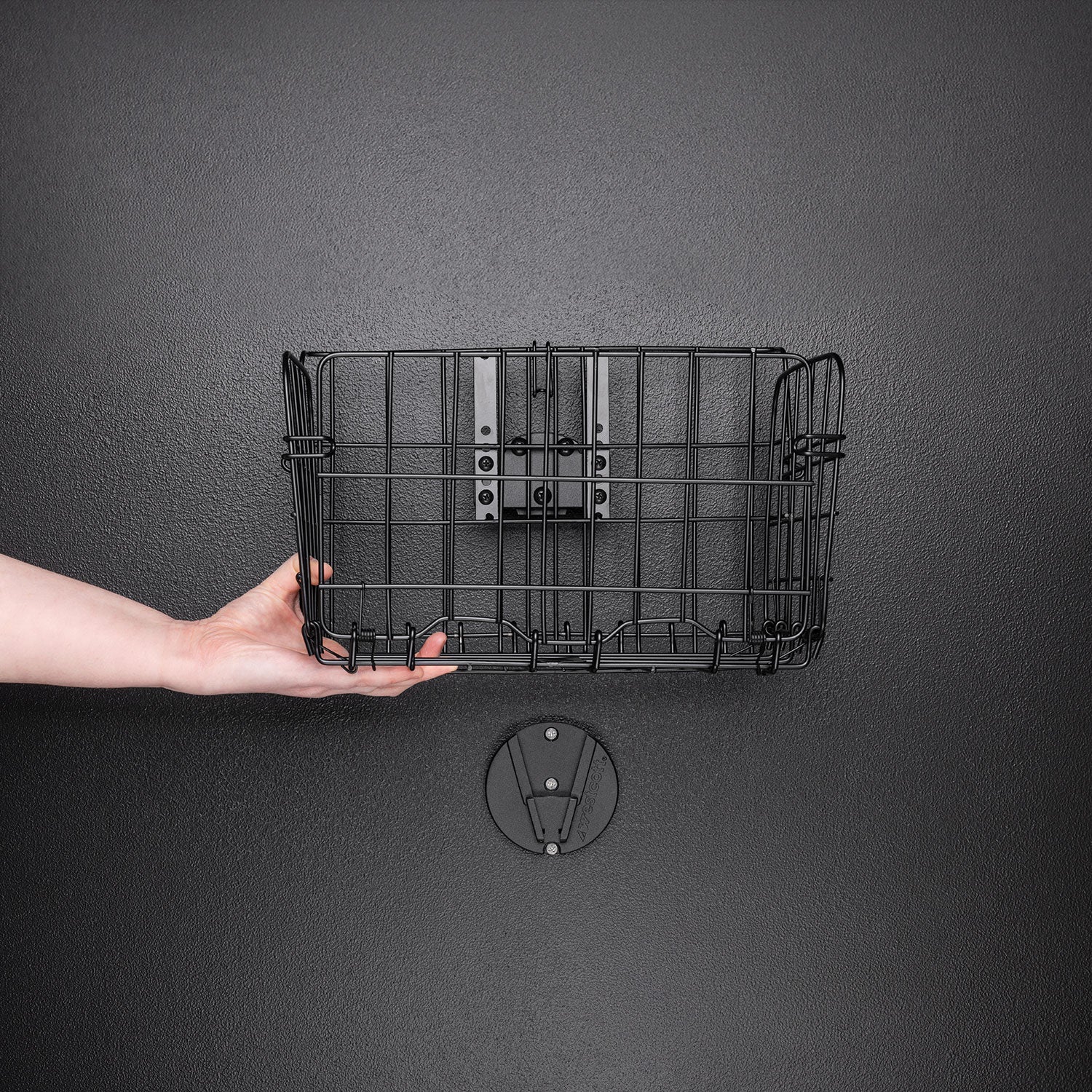 Float Wall Mount Storage Basket being set to installed wall bracket