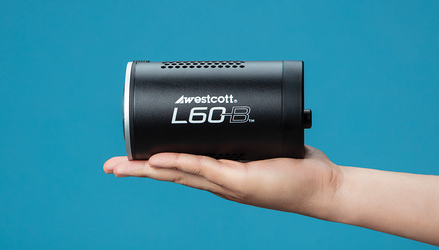 l60-b led cob light behind held in a person's hand