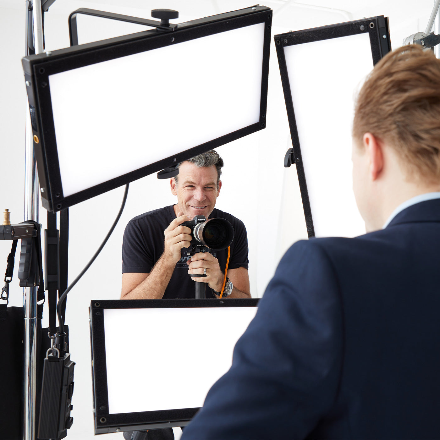 interacting with subject during in-studio portrait photshoot