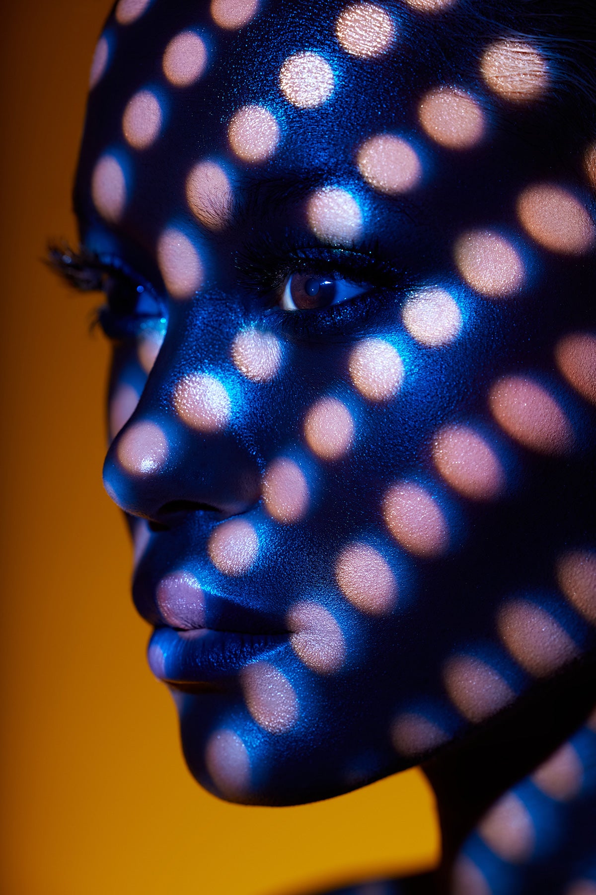 Portrait Using Optical Spot by Lindsay Adler with Pattern Gobo and Creative Color Gel