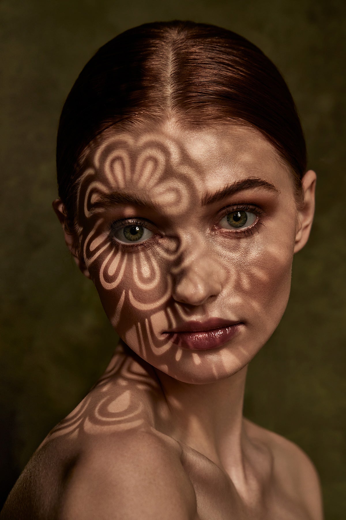Portrait Using Optical Spot by Lindsay Adler with Pattern Gobo on Face