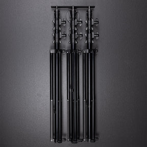 Float Wall Mount Light Stand Hanger shown with light stands in storage