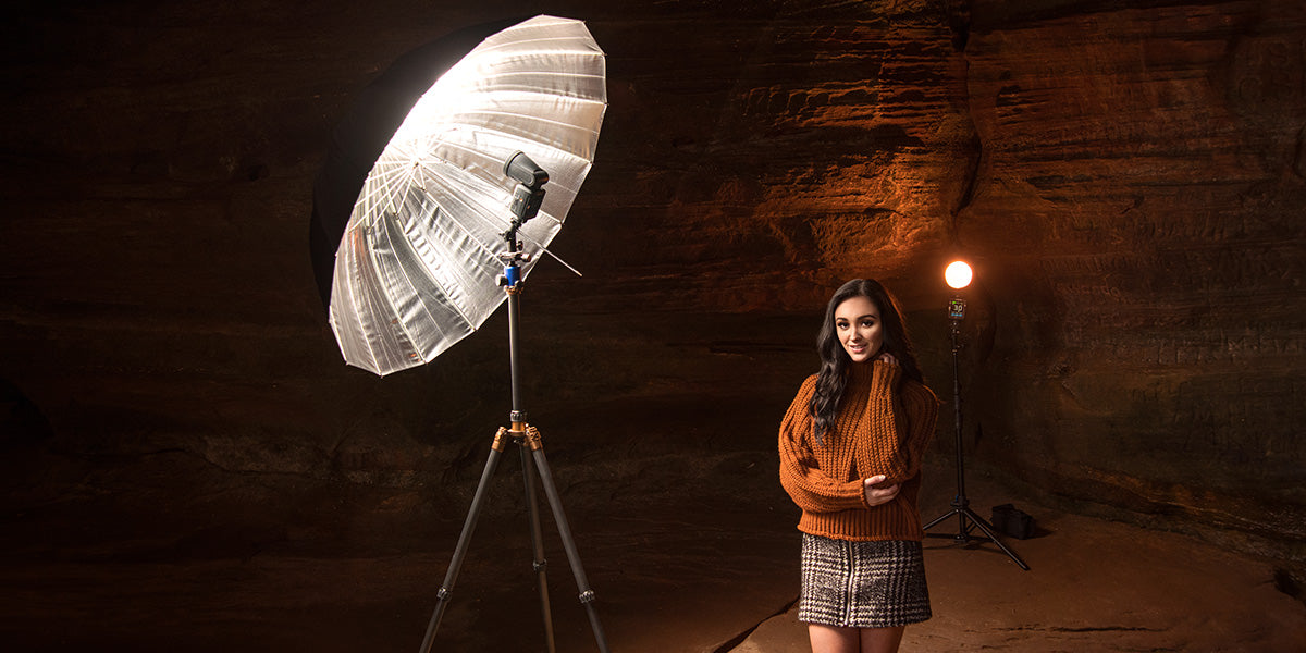 Umbrella with Speedlight Used for Outdoor Portrait in Cave