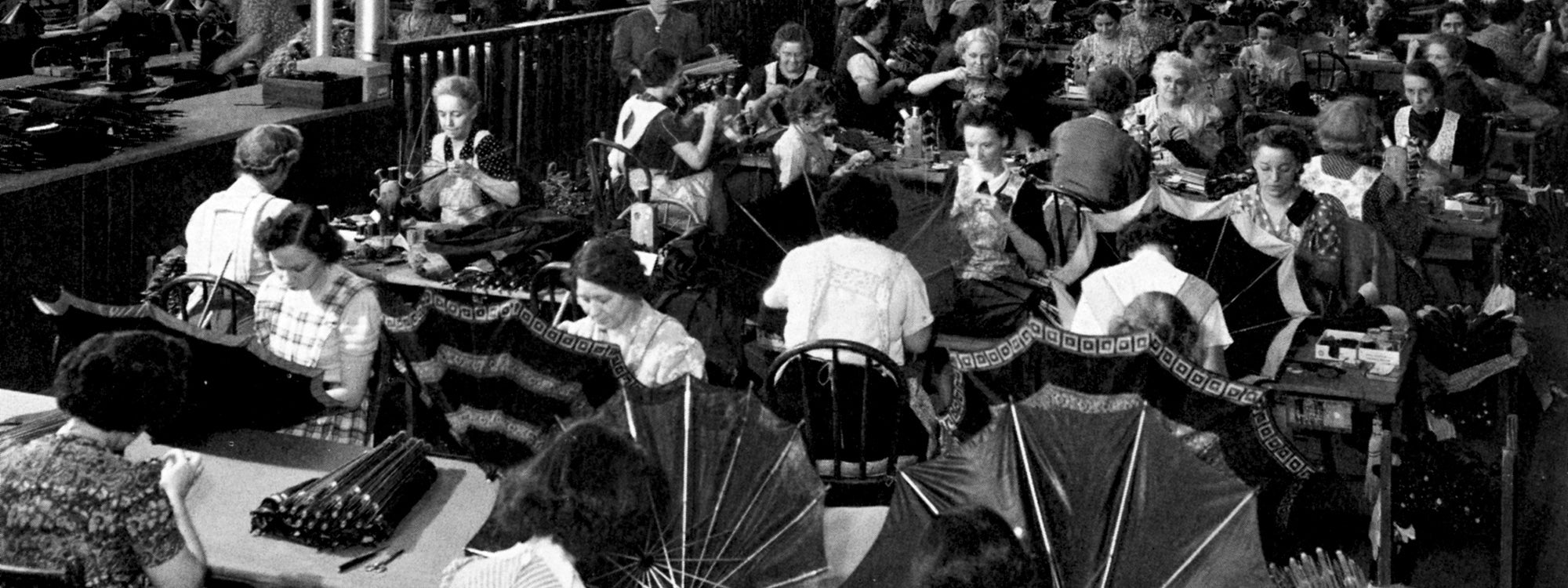 Historical Photo Golf Umbrellas Being Assembled