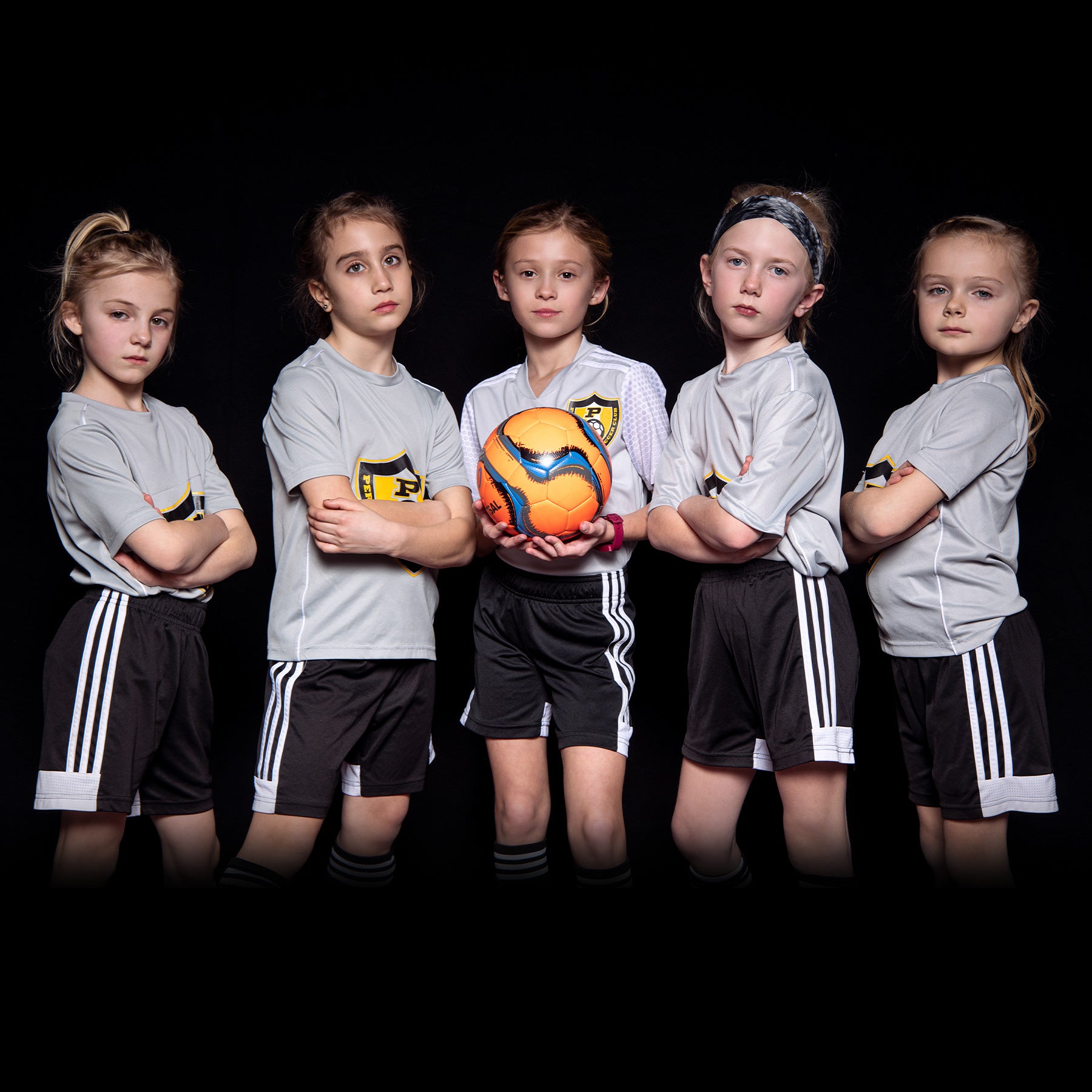 X-Drop Pro Backdrop being used in small group sports team photo